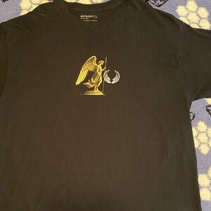 Retrofit Black Tee with Gold Angel Graphic
